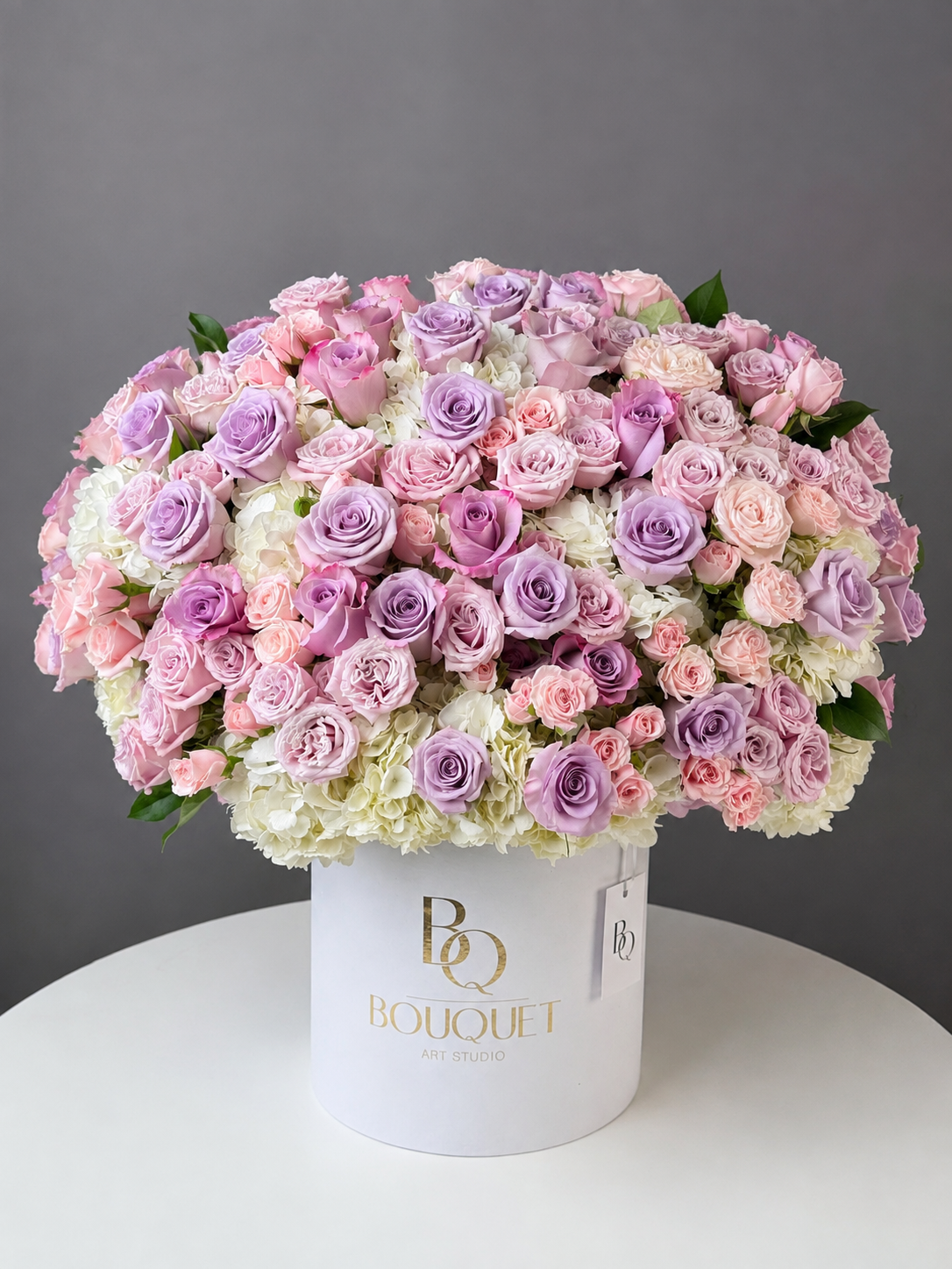 Pink and lavender roses flower box with white hydrangeas by BQ Bouquet