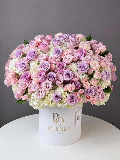 Pink and lavender roses flower box with white hydrangeas by BQ Bouquet