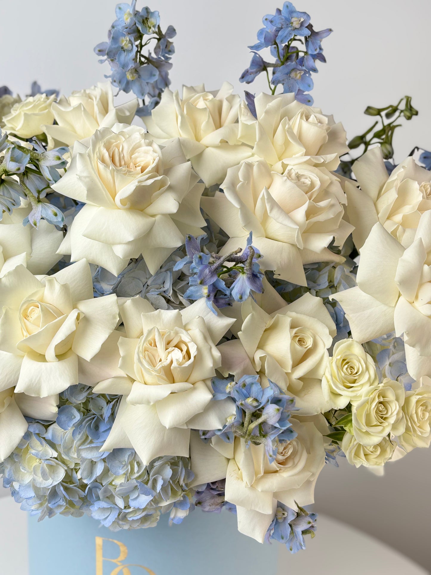 WHITE ROSES, BLUE HYDRANGEA & DELPHINIUM IN LUXURY HAT BOX | BQ BOUQUET